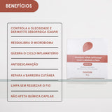 Caixa de Shampoo Sólido Anticaspa. Lista benefícios como controle de oleosidade, antidescamação e reparo da barreira cutânea.